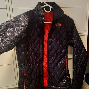 Black and red North Face jacket